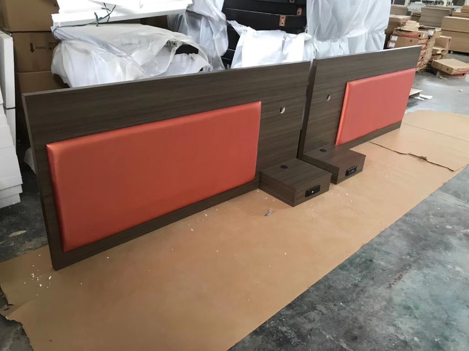 Upholstered headboard with cantilevered nightstand